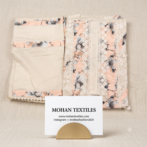 Mohan Textiles off-white and pastel peach floral unstitched dress material with lace border dupatta flat lay