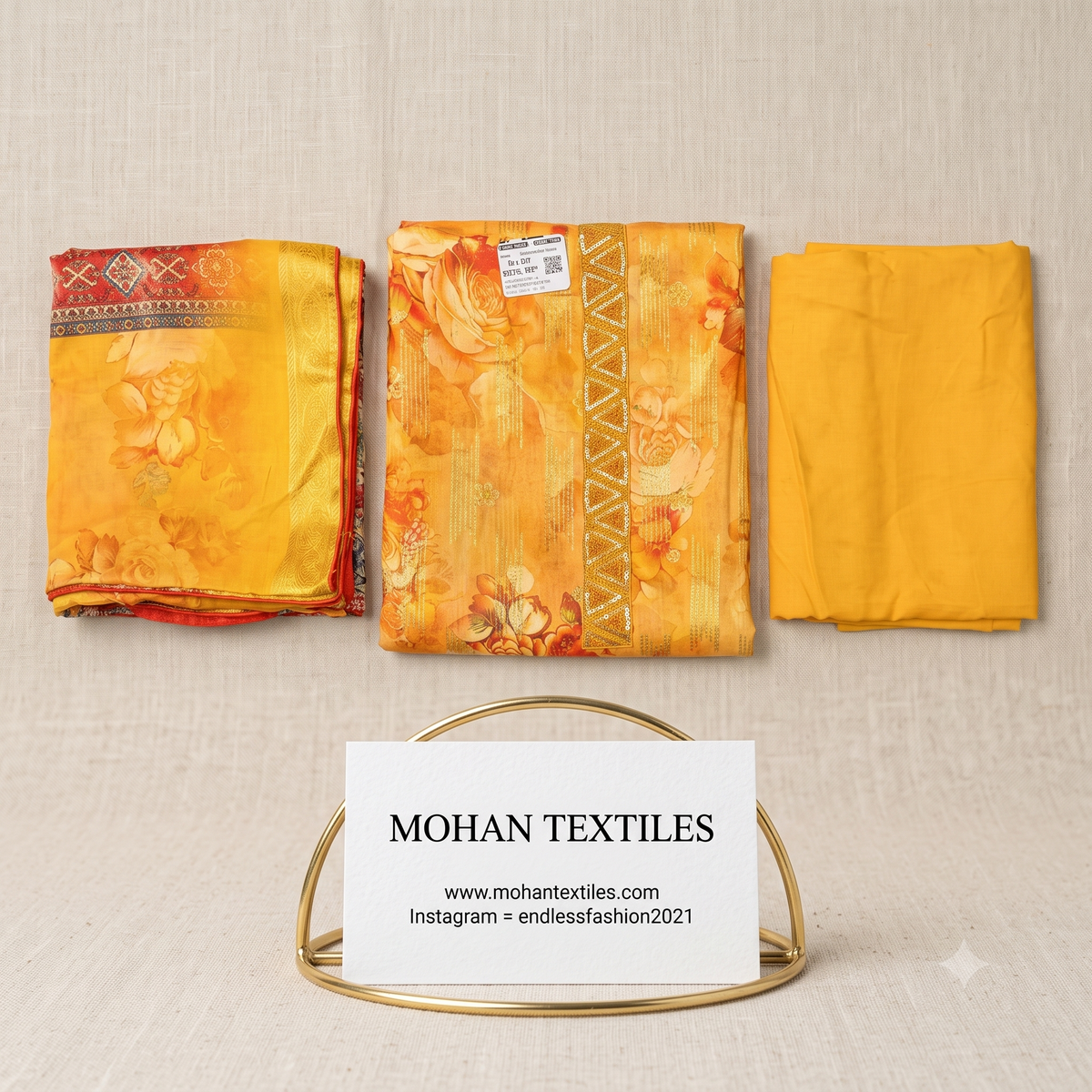 Mustard yellow unstitched floral suit fabric set with embroidered neckline patti and printed dupatta by Mohan Textiles