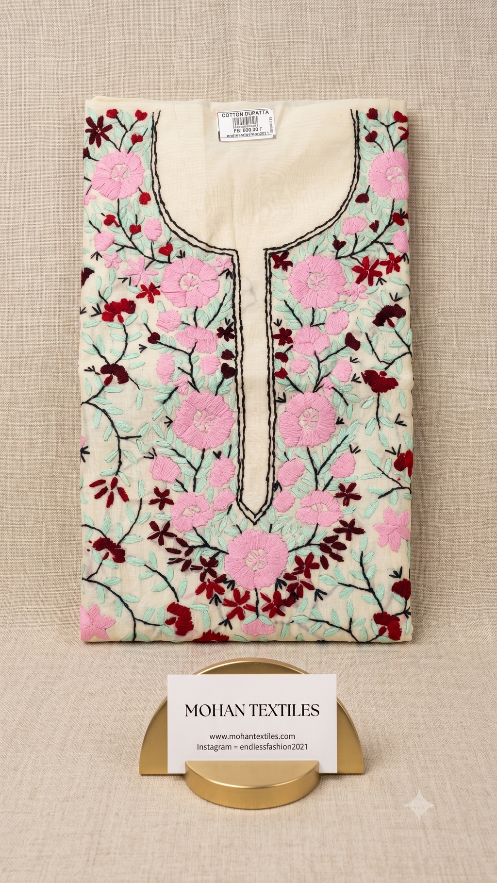 Off-white cotton unstitched Phulkari kurti material featuring pink floral blooms and maroon-tinted leaf embroidery.
