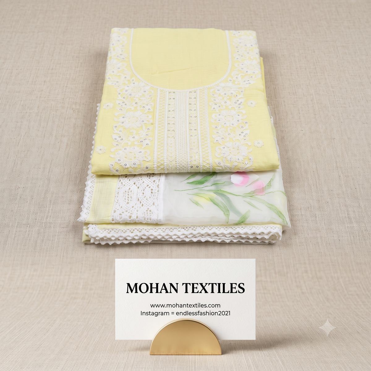 Mohan Textiles bright pastel yellow Karachi style Chikankari embroidered suit set styled with a sheer white floral lace dupatta.