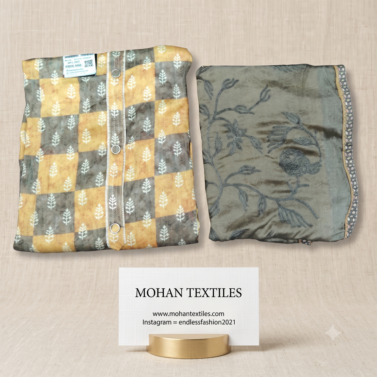 Folded mustard yellow and olive grey checkered silk suit material with embroidered dual-tone dupatta on beige background