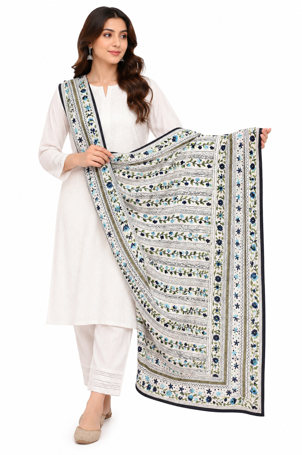 A woman modeling a traditional white three-piece salwar kameez set with a heavily embroidered multicolor dupatta featuring floral patterns and intricate borders.