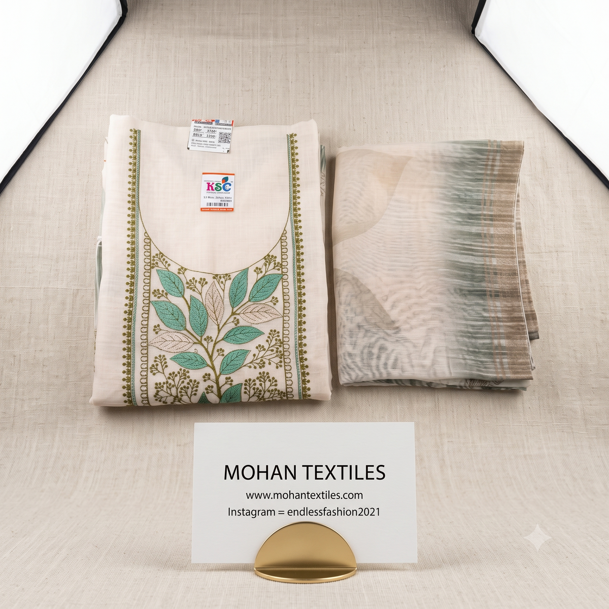 Off-white linen unstitched Punjabi suit material featuring sage green and teal botanical leaf neck embroidery with printed linen dupatta – Mohan Textiles